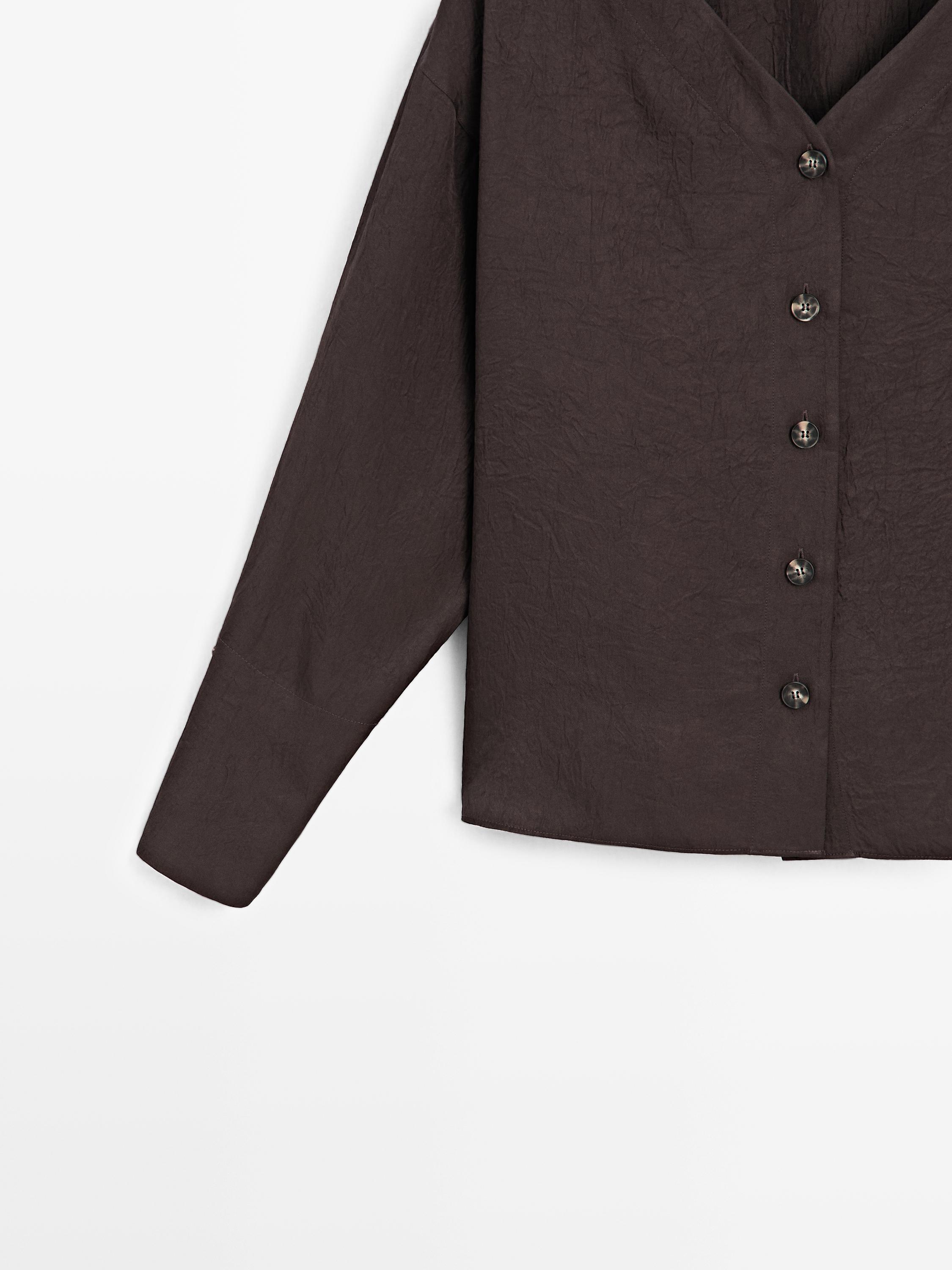 Flowing blouse with button details